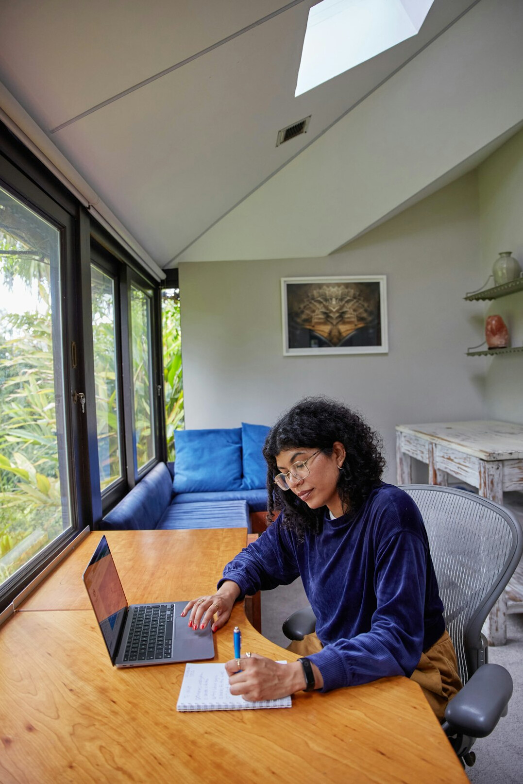 adult studying at home desk