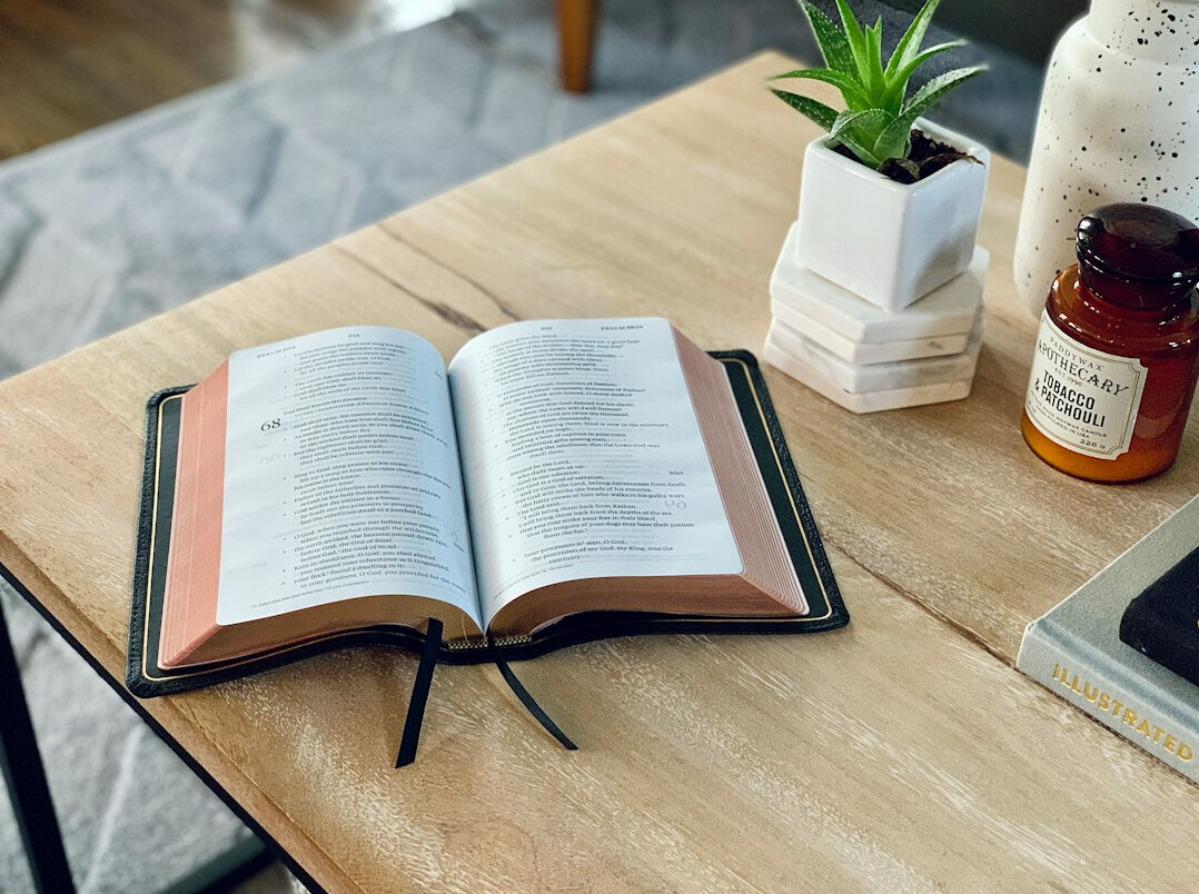 Open books and notes on a study desk