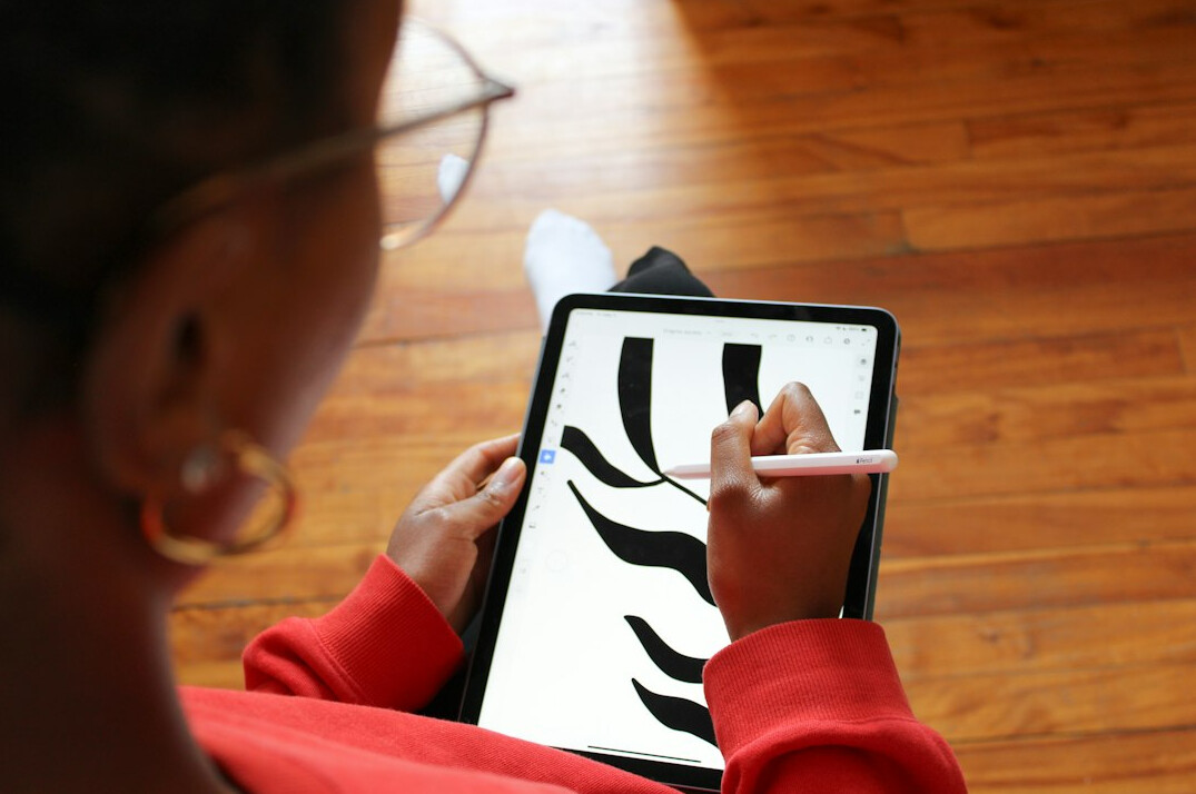 woman learning graphic design