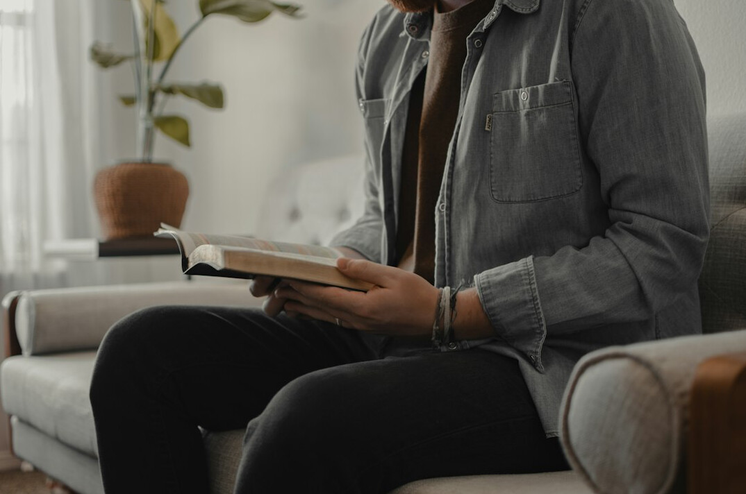adult student reading book